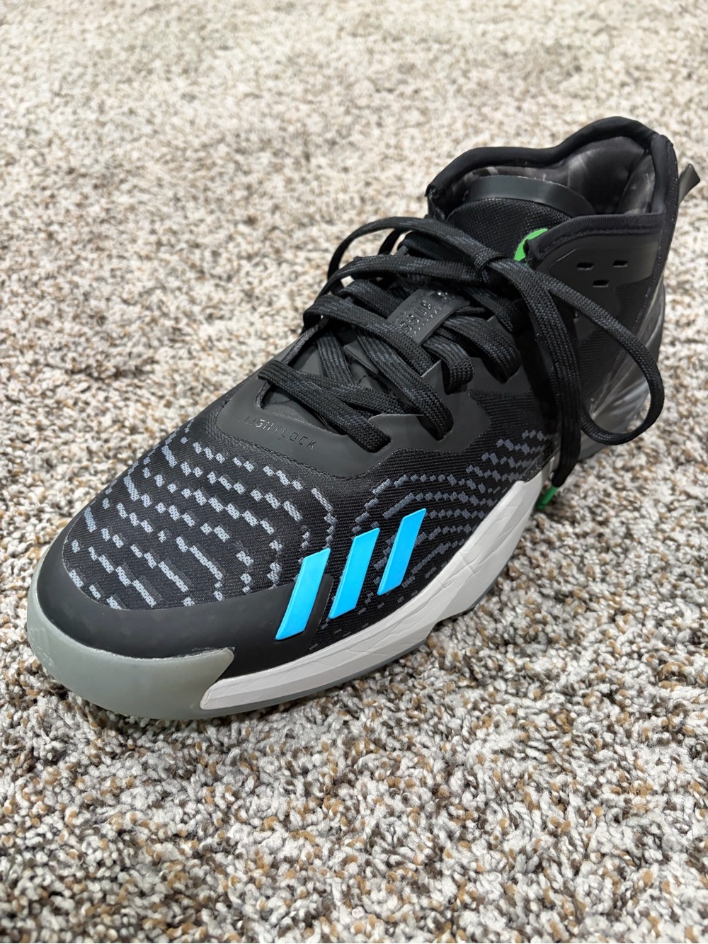 adidas Men's D.O.N Issue #4 Black Sneaker with Bright Blue Three Stripes